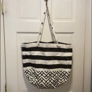 NWOT cotton tote with changeable straps; paw prints or geometric shapes